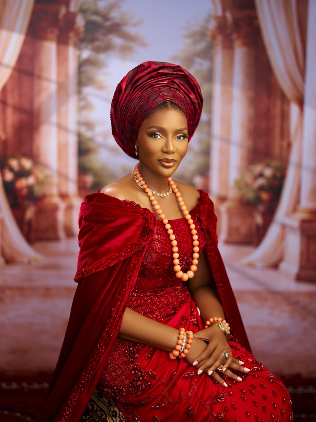 Olori Atuwatse III in red and coral beads