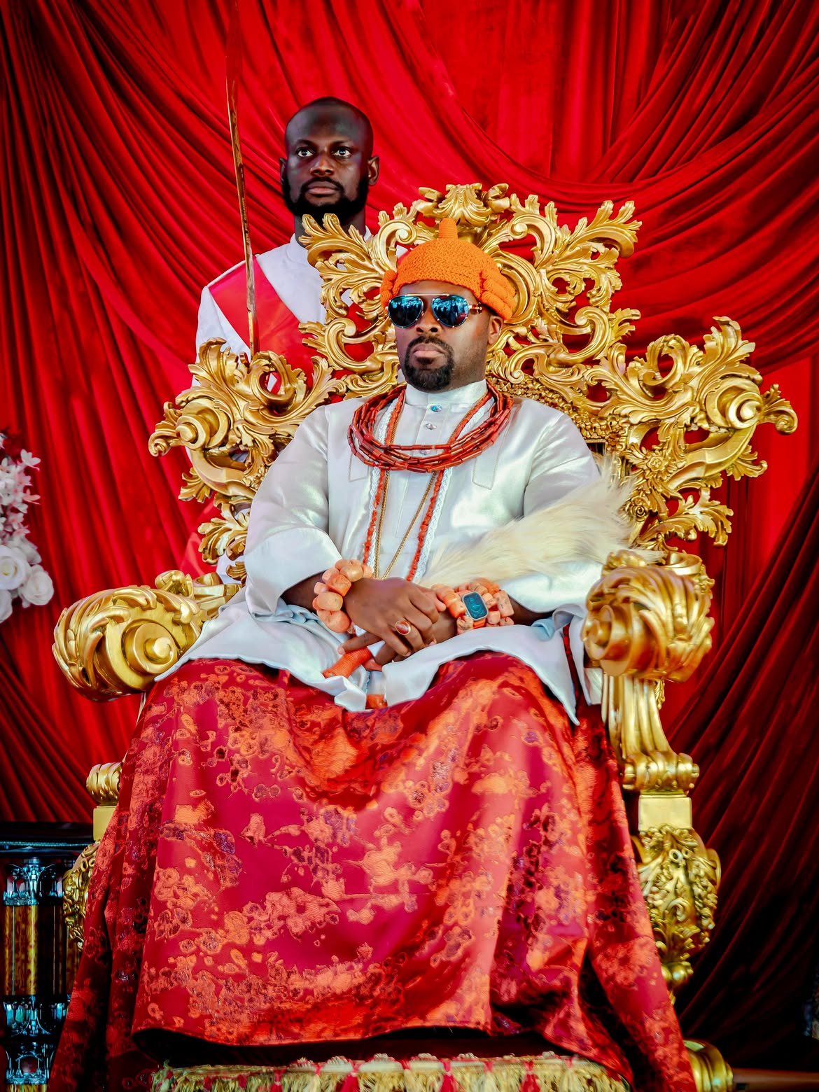 Ogiame Atuwatse III seated on the throne at Aghofen