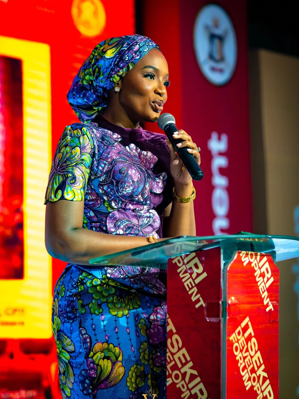 Forum speaker at the development event podium