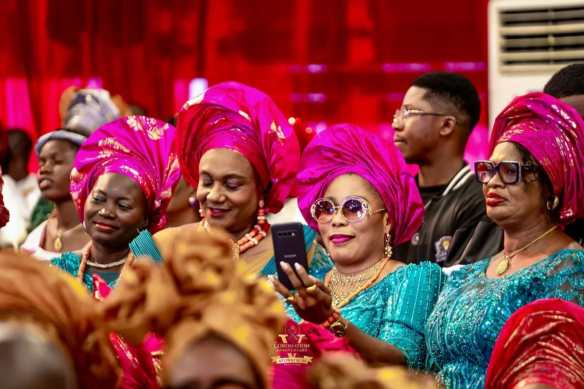 Thanksgiving guests in colourful traditional attire